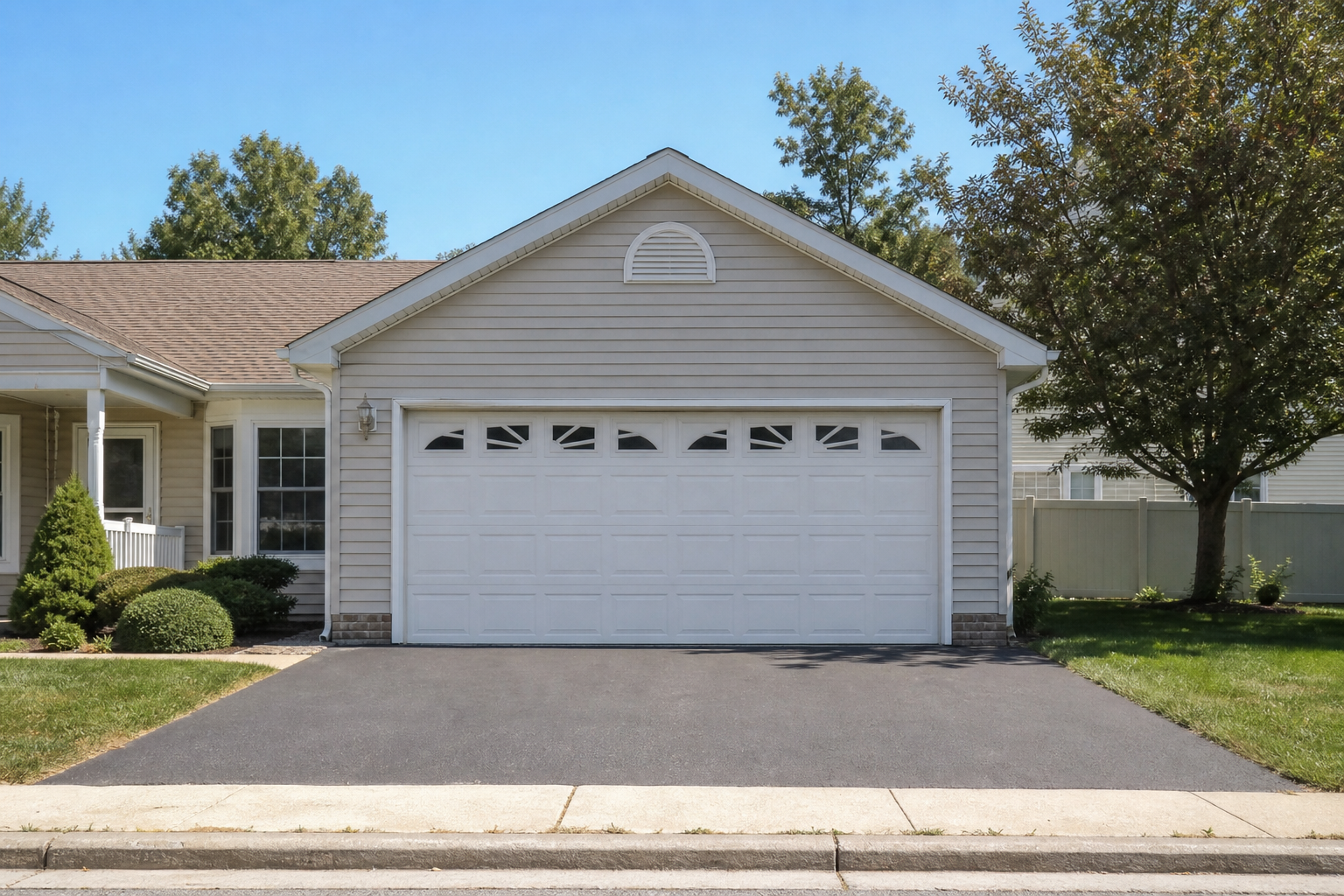 Suburban garage door on a quiet Voorhees, NJ residential street